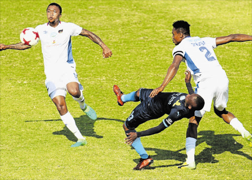 HOT STUFF: Ayanda Konqobe and James Okwoso of Chippa United keep a close eye on Khama Billiat of Mamelodi Sundowns during their Telkom Knockout Cup game at Sisa Dukashe Stadium in Mdantsane Picture: MICHAEL PINYANA