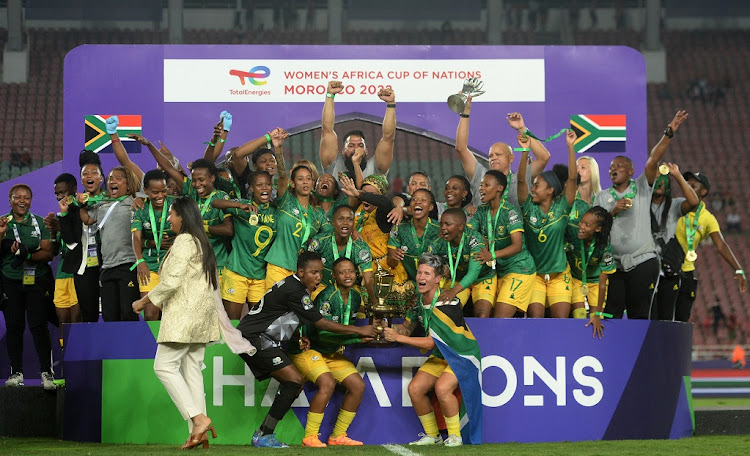 Banyana Banyana celebrate lift the trophy after winning 2022 Women's Africa Cup of Nations final against Morocco at Stade Prince Moulay Abdellah in Rabat.