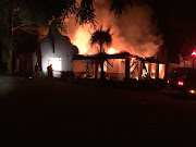 A farmhouse was torched as a community protest turned violent in the rural community of Eshowe, in northern KwaZulu-Natal, on Sunday night.