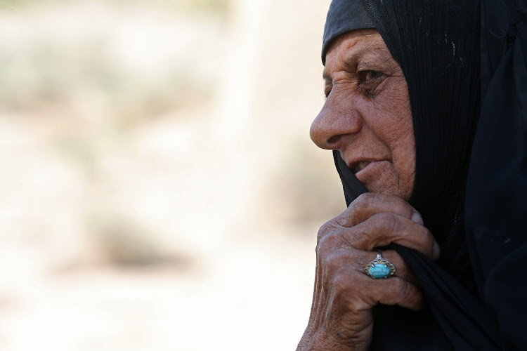 Hedyya Ouda, a resident of Al-Bouzayyat in Iraq, says most of the villagers have left since a canal that formed part of a network of waterways east of the Euphrates dried up earlier in 2022. Picture: REUTERS/ALAA AL-MARJANI