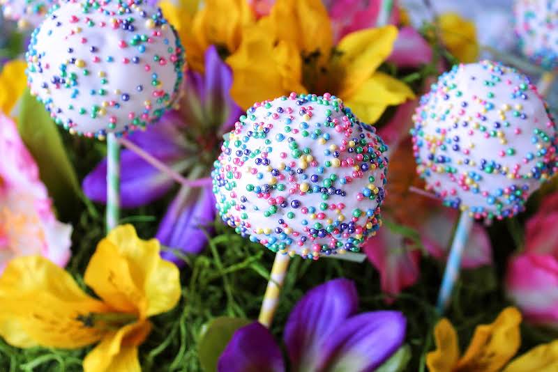 Three Easter Cake Pops Decorated With Sprinkles.