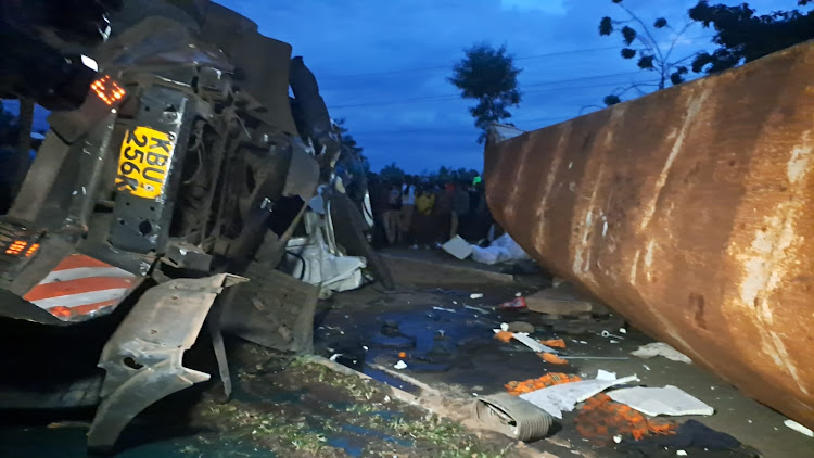 The mangled wreckage of the lorry and tuk tuk at the scene of accident at Kachok fly over in Kisumu, Tuesday, May 16, 2023.