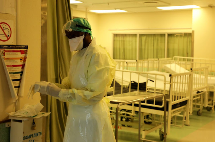 A health worker in the Livingstone Hospital Covid-19 isolation section