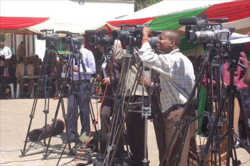 Journalists covering an event. Photo/Monicah Mwangi