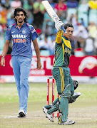A BIG DAY: Quinton de Kock celebrates his century during the second ODI against India in Durban yesterday Picture: