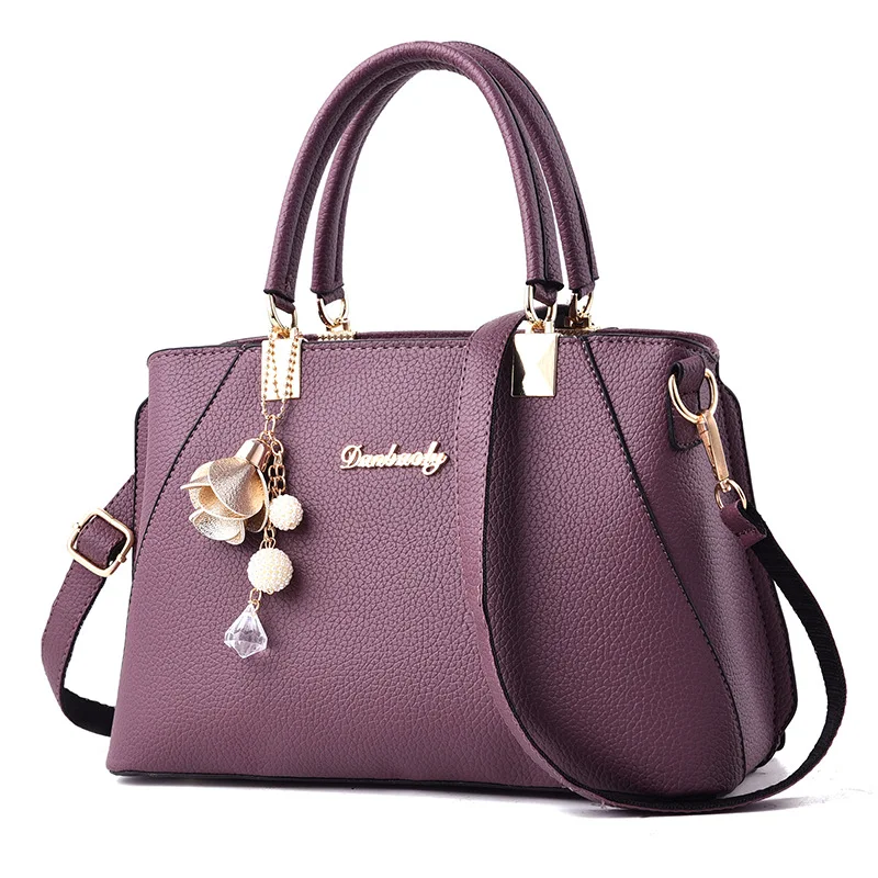 Nouveau sac à main femme à épaule unique motif litchi. Un accessoire tendance et élégant, parfait pour compléter votre look avec style et ajouter une touche de sophistication.