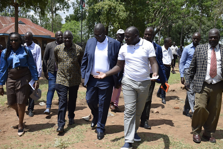 Habitat for Humanity Kenya official Grace Nanda, Homa Bay DG Oyugi Magwanga,Habitat for Humanity Kenya director Anthony Okoth among other local leaders at Manga primary in Rangwe constituency on May 19,2023