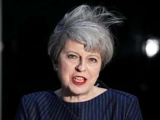 Britain's Prime Minister Theresa May speaks to the media outside 10 Downing Street, in central London, Britain April 18, 2017. /REUTERS