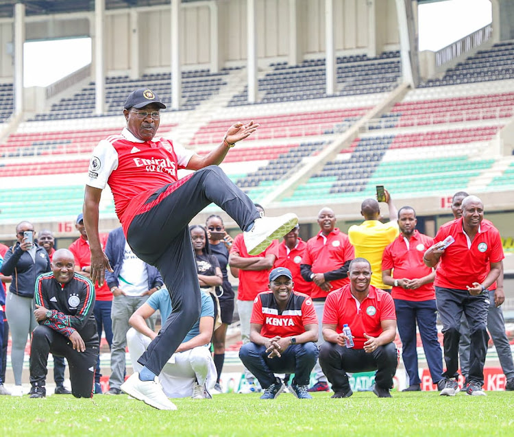 National Assembly Speaker Moses Wetang'ula displays his soccer skills as parliamentary staff cheer him on at Kasarani stadium on September 15, 2023.