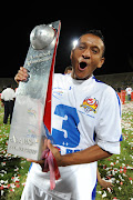 Serial winner Daine Klate with the Absa Premiership trophy he won with SuperSport United in 2008/09.