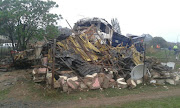 An articulated truck flattened a house in Copesville, Pietermartizburg, on Friday morning. Four children who were inside somehow survived.