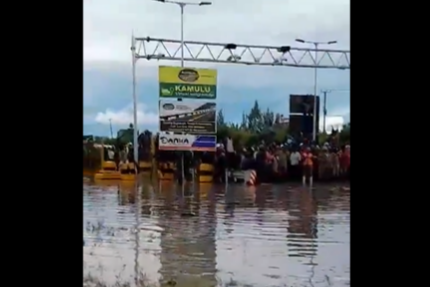 Starnded road users ponder their next move following the flooding of Kamulu-Kangundo Road at Joska Athi River Bridge, May 1, 2024.