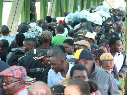 Commuters walk after being dropped off at Ngara, Monday, December 3, 2018. /VICTOR IMBOTO