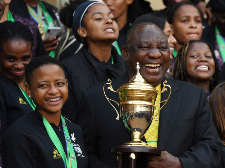 President Cyril Ramaphosa and Banyana Banyana captain Refiloe Jane hold the 2022 Women's Africa Cup of Nations trophy at the Union Buildings in Pretoria last year.