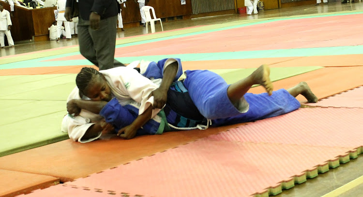 Diana Kana wrestles Mary Maina to the mat in a past action at Kasarani