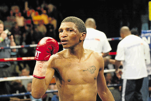 LORD OF THE RING: The life of three-time world champion Mzukisi Sikali, above, was cut short. There has not been a fighter like him, but Miranda Malajika shows promise