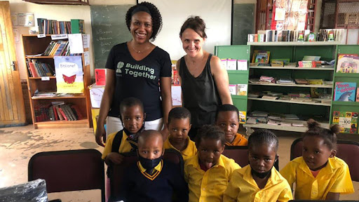 Pupils at the Masakhane Combined School receive the donated computers.