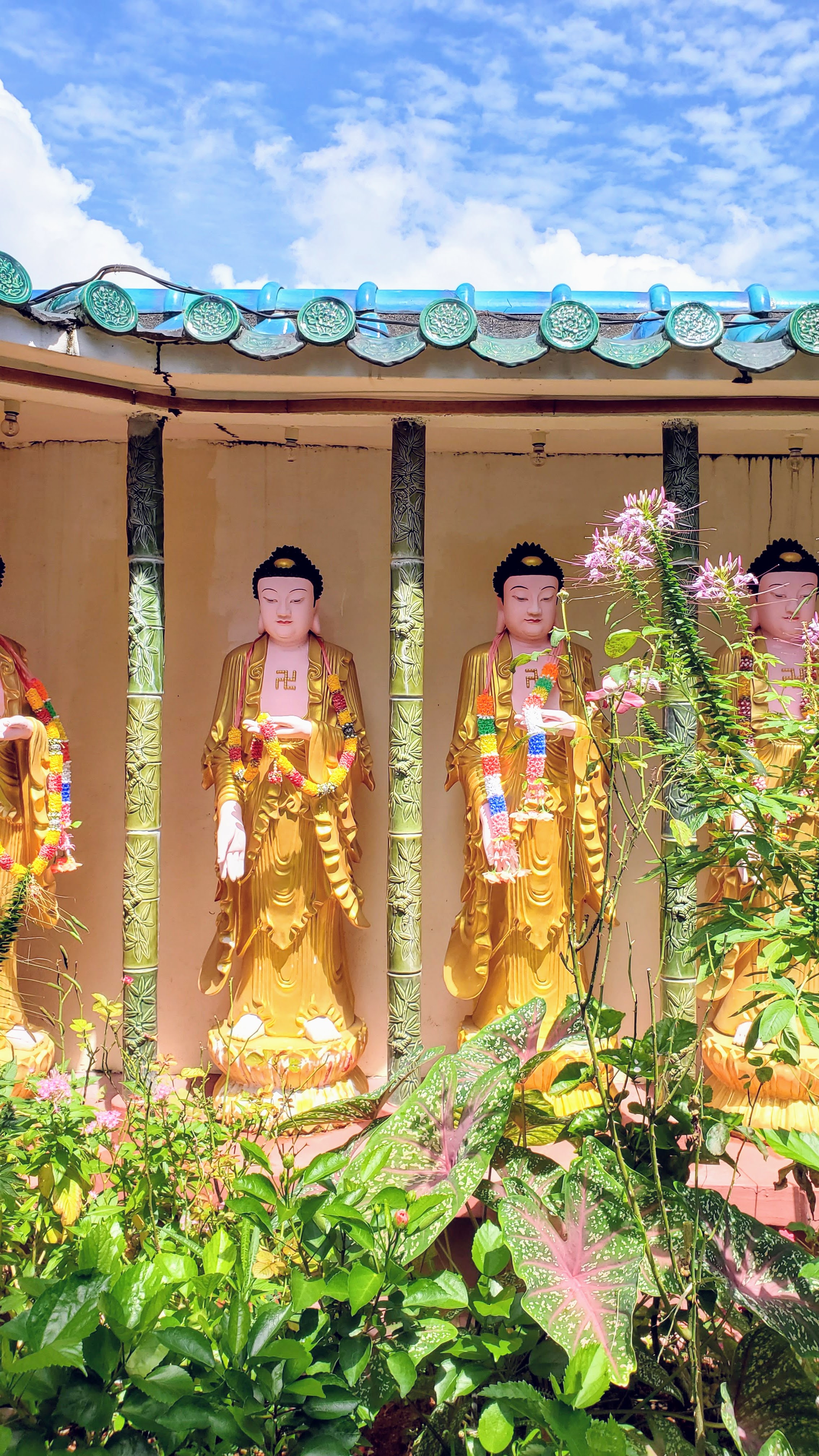 Visiting Kek Lok Si: What makes it unique is that among its millions of Buddhas it shows the blending of cultures that is so representative of Malaysia by including many stylistic representations of Buddha.