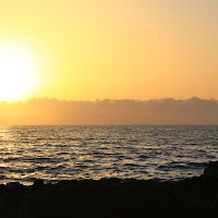 Orange colore di un tramonto al mare di 