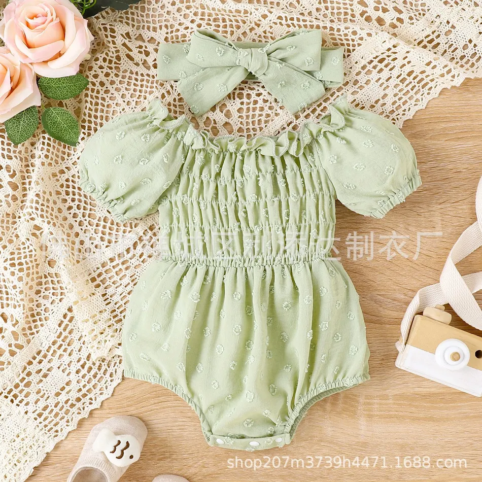 Baby meisje romper met pofmouwen, jumpsuit en strik. Comfortabel en stijlvol voor je kleine meid. Perfect voor de zomer.