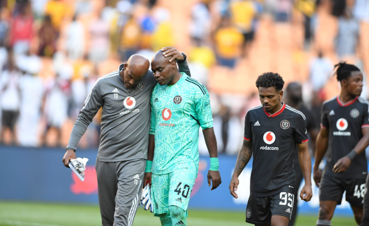 Orlando Pirates goalkeeper coach Tyrone Damons consoles keeper Siyabonga Mpontshane after the DStv Premiership Soweto derby against Kaizer Chiefs at FNB Stadium on October 29. Picture: Lefty Shivambu/Gallo Images