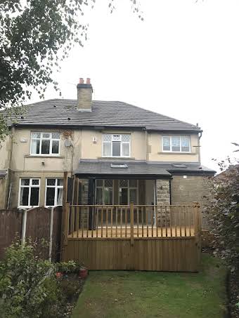 Single storey extension/Sunroom with raised decking and new bespoke kitchen album cover