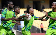 Monde Mphambaniso of Marumo Gallants celebrates a goal with teammates during the CAF Confederation Cup match against Al-Ahly Tripoli at Royal Bafokeng Stadium.