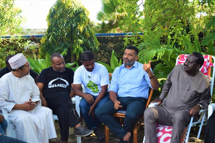 Opposition chief Raila Odinga with other leaders at his Nyali home in Mombasa on Tuesday.