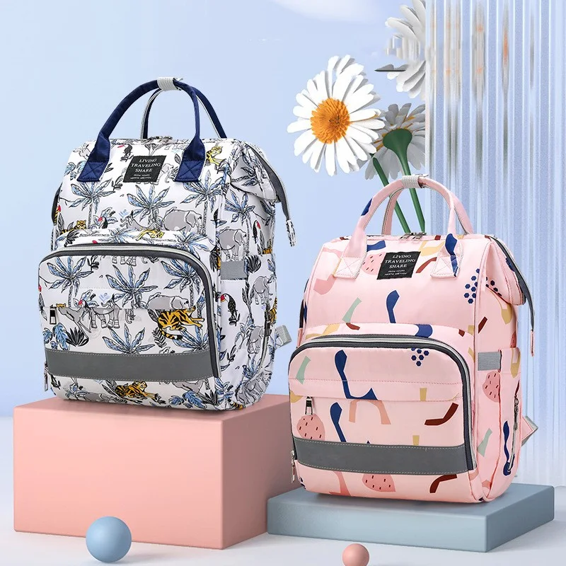 Sac à langer bandoulière grande capacité, tendance et stylé pour maman, idéal pour les sorties avec bébé.