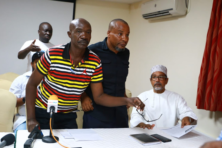 Fast Action Business Community legal officer Philip Jagero, chair Salim Karama and Muhuri chair Khelef Khalifa at PrideInn Hotel in Mombasa on Saturday, October 5, 2019.