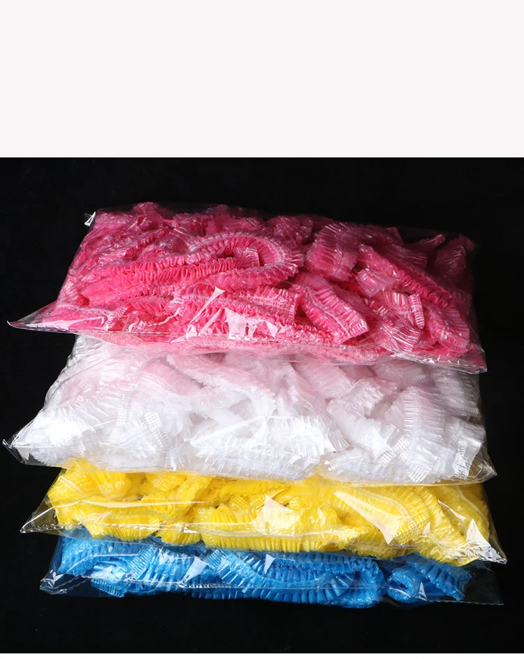 Cuffia per doccia monouso impermeabile per adulti. Protegge i capelli dall'acqua durante la doccia o il bagno. Perfetta per viaggi, spa e uso quotidiano.