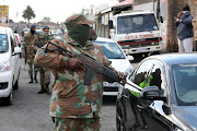 SANDF members on patrol in Alexandra township on Thursday. 