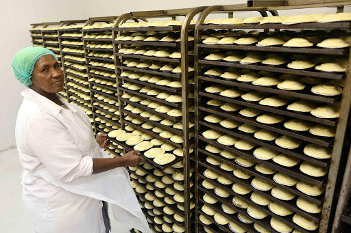 PIE HEAVEN: A general worker at Shamrock pies, Sylvia Mgxwati, loads pies onto a tray to be baked. Picture: STEPHANIE LLOYD