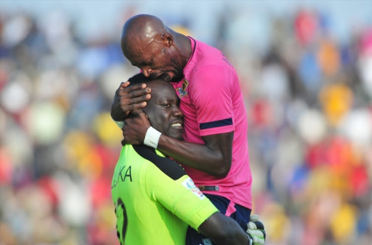 Jean Munganga of Black Leopards and Rotshidzwa Muleka of Black Leopards celebrates team 1st goal during the National First Division Promotion and Relegation Playoff match between Black Leopards and Jomo Cosmos at Thohoyandou Stadium on May 30, 2018 in Thohoyandou, South Africa.