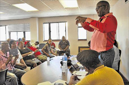 WORKER-CENTRED: Expelled Cosatu general secretary Zwelinzima Vavi detailing a programme of action to workers amid plans to launch a new federation