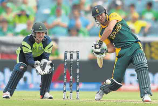 CAPTAIN FANTASTIC: Proteas’ batsman AB de Villiers plays a shot during their ICC Cricket World Cup match against Ireland at the Manuka Oval in Canberra yesterday Picture: EPA