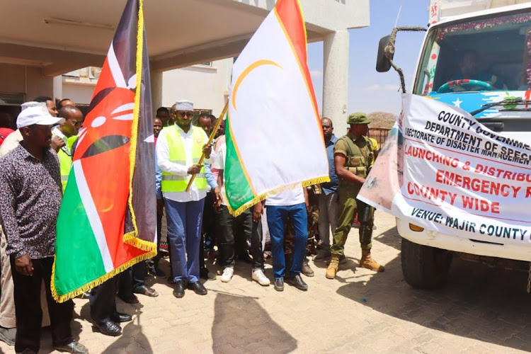 Wajir Governor Ahmed Abdullahi flagging off relief food