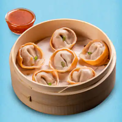 Steamed Schezwan Paneer Momos With Momo Chutney