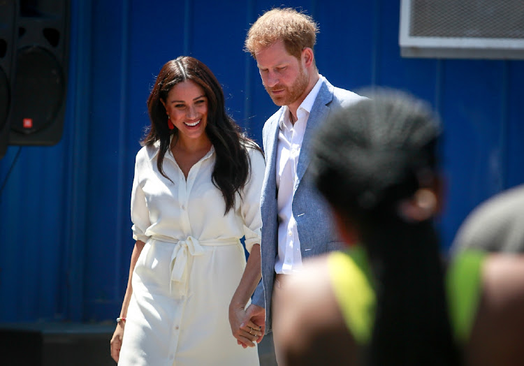 2 October 2019: The Duke and Duchess of Sussex, Prince Harry and Meghan Markle, took a tour of the Youth Employment Services Hub in Tembisa Township. They are pictured here with the YES Initiative CEO, Tashmia Ismail-Saville who took them around the premises.