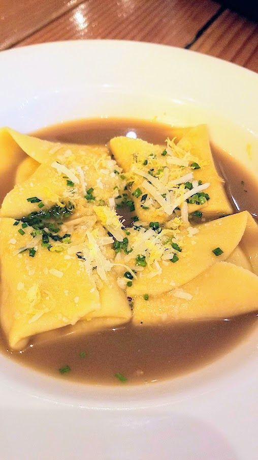 Truffled riccotta and pancetta ravioli in parmesan brodo for Portland Dumpling Week 2019 from Nel Centro