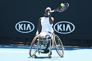 Kgothatso Montjane plays a forehand in her Women's Wheelchair Singles semifinals match against Yui Kamiji of Japan on day eleven of the Australian Open at Melbourne Park on January 30 2020.