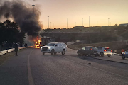 Protesters torched and looted a truck transporting milk in Diepkloof, Soweto last Monday. File photo. 