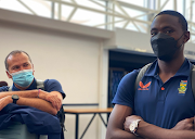 Kagiso Rabada poses at the airport in Christchurch before the team took a chartered flight back to SA.