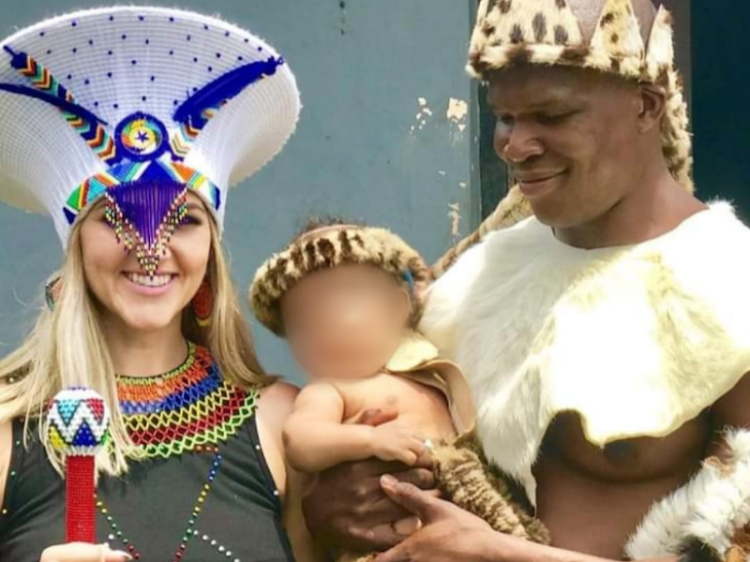 Lindani Myeni and his wife Lindsay with their first-born child.