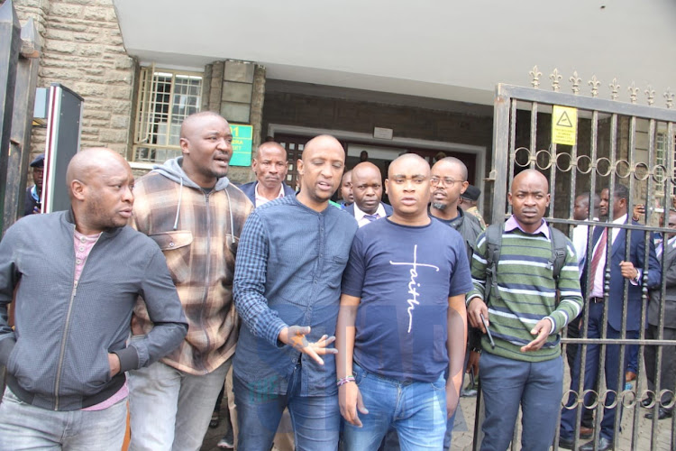 Majority Leader Abdi Guyo (Third, Left) outside City Hall.