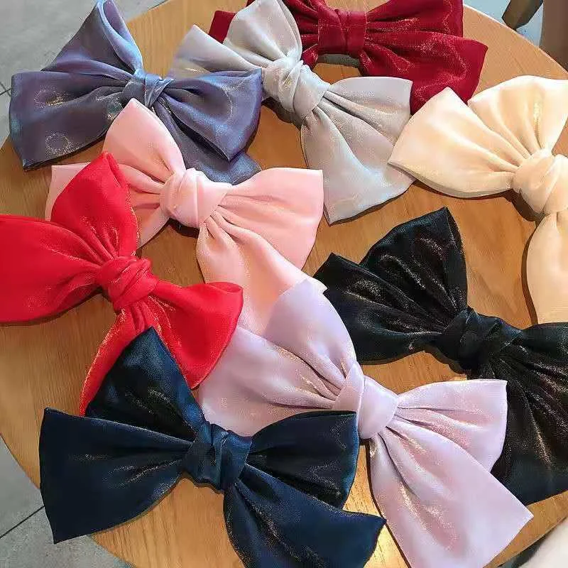 Zeemeermin Franse Parelmoer Satin Strik Haarspelden, voor elegante kapsels. Voeg een vleugje glamour toe aan elke look.