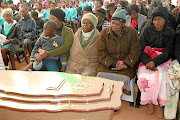 Terry Diale at the funeral  of her teenage child  Dimakatso.