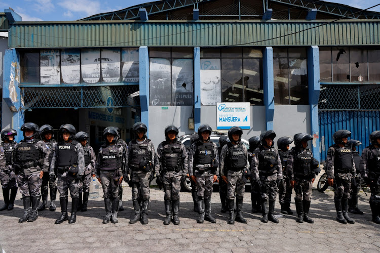 Policemen outside El Inca prison after a security operation due to riots, following the disappearance of Adolfo Macias, leader of the Los Choneros drug gang, in Quito, Ecuador, January 8 2024. Picture: KAREN TORO/REUTERS