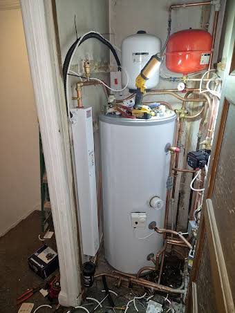 Electric boiler installation with unvented hot water cylinder  album cover