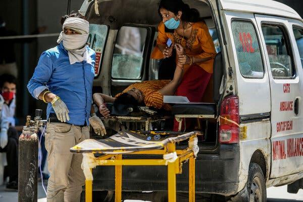 A Covid-19 patient waiting to be admitted to a hospital in South Delhi, on Saturday.